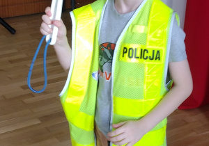 Ignaś w kamizelce odblaskowej